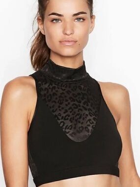 Victoria's Secret Black/Leopard Print Mesh
Panel Mock Neck Crop Top. Size Medium
